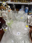 A quantity of glassware including glass tazza, sundae dishes together with Staffordshire dogs and