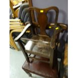 A single antique dining chair and a vintage child's chair