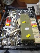 A large quantity of loose cutlery and a few items of boxed cutlery