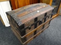 A late nineteenth century dome top cabin trunk