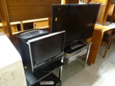 A Panasonic Viera flatscreen TV with stand and other electricals including smaller TV, shredder etc