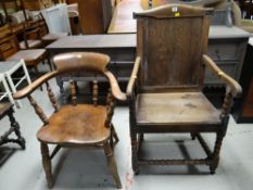 A vintage wooden elbow desk-chair and an earlier wooden farmhouse chair with bobbin supports