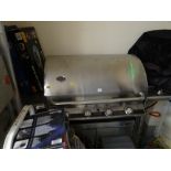 A Fire Mountain professional chrome gas barbecue and accessories