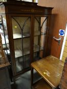 A vintage painted mahogany two-door standing china cabinet