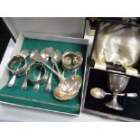 A parcel of silver tableware including a set of six monogrammed tea spoons, a pair of silver