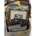 A box of old framed pictures etc