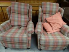 A pair of vintage (circa 1930s) wingback armchairs in newly upholstered tartan fabric