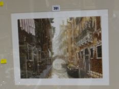 A framed limited edition print of Venetian canal