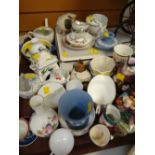 A tray of various china ornaments including moustache cups, Toby Jugs, Wedgwood Jasperware etc