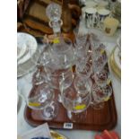 Cut glass ships decanter and a quantity of drinking glasses