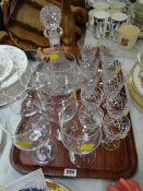 Cut glass ships decanter and a quantity of drinking glasses