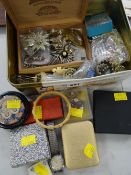 Tin of various costume jewellery including brooches, vintage gents rotary wristwatch, ladies