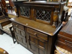 A Priory or style buffet sideboard with glazed top