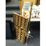 A 1950s brass effect standard lamp together with an old printers letter tray