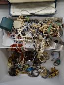 A box of various costume jewellery including ladies' wristwatches, necklaces etc
