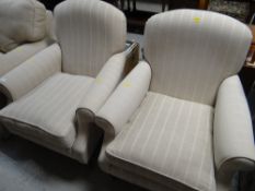 A pair of modern striped armchairs