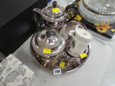Four-piece EPNS tea set on circular tray