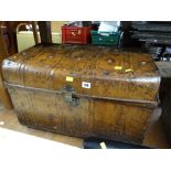 A vintage metal tin trunk