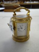 A small brass carriage clock by Angelus