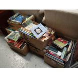 Seven boxes of various paperback & hardback books relating to Wales, art & travel