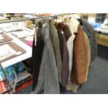 A rail of ladies vintage coats including sheepskin, fur collared etc