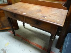 A two-drawer vintage writing desk