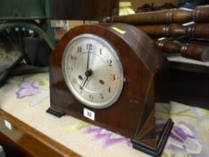 An Art Deco-style inlaid mantel clock