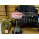 Parcel of items to include pink glass based oil lamp, brass effect warming pan and a vintage log