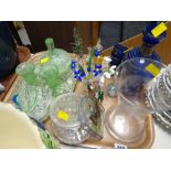 A tray of various glassware including green glass dressing table set, blue glass decanter etc