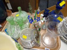A tray of various glassware including green glass dressing table set, blue glass decanter etc