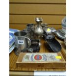 A tray of metal ware including pewter tankards, boxed cutlery etc