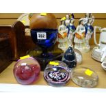 A Bristol blue glass goblet, five various paperweights including Caithness etc