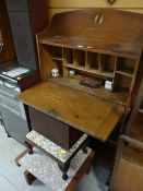 A vintage compact bureau bookcase (key with us), a tapestry stool, coffee table etc