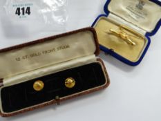 Two 12ct gold front studs and two small 9ct bar brooches
