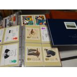 Five volumes of Royal Mail issued stamp postcards together with a Royal Mail edition of HRH The