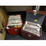 Two cases of single vinyl records from the 70s & 80s