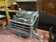 A vintage ornate coal effect electric fire