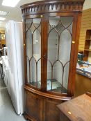 A good quality Arthur Llewelyn standing corner cabinet in mahogany and yew (purchased 2001 - receipt