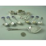 A SMALL PARCEL OF FIVE SILVER SPOONS - sugar tongs, jam spoon, napkin ring and a half bright cut