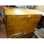 AN ANTIQUE PINE DOME TOPPED CAPTAIN'S CHEST with iron carry handles, 57 cms high, 91 cms wide, 50.