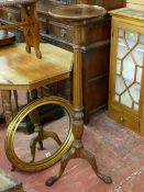 A REPRODUCTION MAHOGANY TORCHERE STAND and a classically styled gilt framed wall mirror