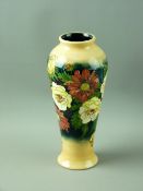 A MOORCROFT COLLECTOR'S CLUB FLORAL DECORATED VASE, designed by Emma Bossons, decorated on a tonal