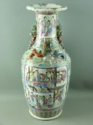 A LARGE 19th CENTURY CHINESE CANTONESE DECORATED VASE in typical enamel colours, showing bordered