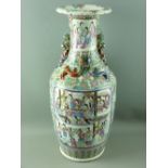 A LARGE 19th CENTURY CHINESE CANTONESE DECORATED VASE in typical enamel colours, showing bordered
