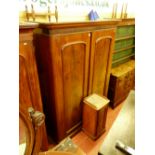 A VICTORIAN MAHOGANY TWO DOOR WARDROBE with a near matching pot cupboard, the wardrobe with inverted