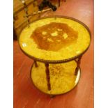 A MID CENTURY ITALIAN INLAID CIRCULAR TEA TROLLEY, the two tiers with burr walnut and multi-wood