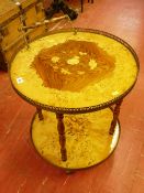 A MID CENTURY ITALIAN INLAID CIRCULAR TEA TROLLEY, the two tiers with burr walnut and multi-wood