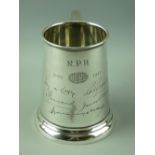 A HALLMARKED SILVER GLASS BOTTOMED PINT TANKARD of cylindrical tapering form with scroll handle,