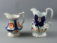 TWO MID 19th CENTURY GAUDY WELSH JUGS, decorated in 'Llangollen' and 'Celyn' patterns, 21.5 cms high
