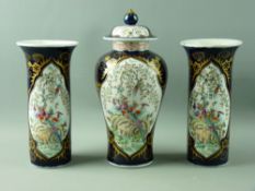 AN ORIENTAL THREE PIECE GARNITURE SET of pair of chimney vases and centre baluster vase with knopped